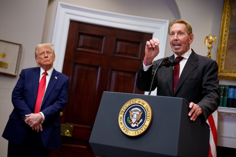 Oracle co-founder, CTO and Executive Chairman Larry Ellison, accompanied by U.S. President Donald Trump