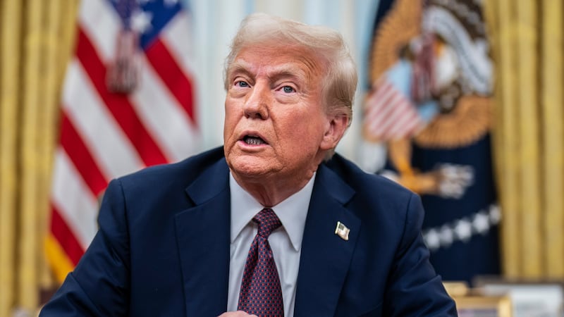 Washington, DC - January 23 : President Donald J Trump speaks with reporters and signs executive orders in the Oval Office at the White House on Thursday, Jan 23, 2025 in Washington, DC. (Photo by Jabin Botsford/The Washington Post via Getty Images)