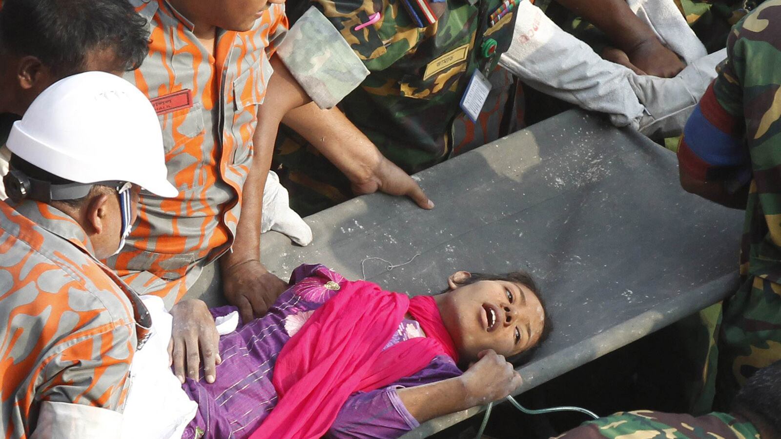 galleries/2013/05/10/woman-rescued-from-rubble-17-days-after-bangladesh-factory-collapse-photos/garment-rescue-tease_txghvs