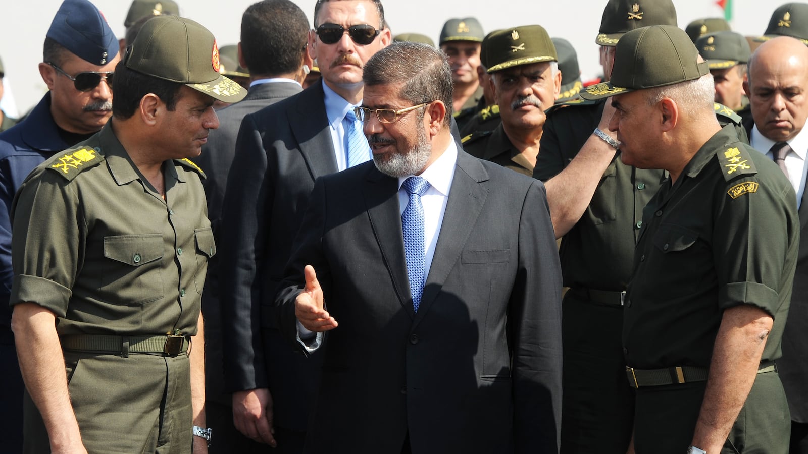 cheats/2013/07/31/e-u-envoy-visits-mursi/130731-Mohamed-Mursi-cheat_cgtoax