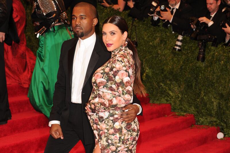 articles/2013/06/21/north-west-behind-kim-and-kanye-s-odd-baby-name-choice/130621-Satran-Kimye-Name-tease-new_wibzo9