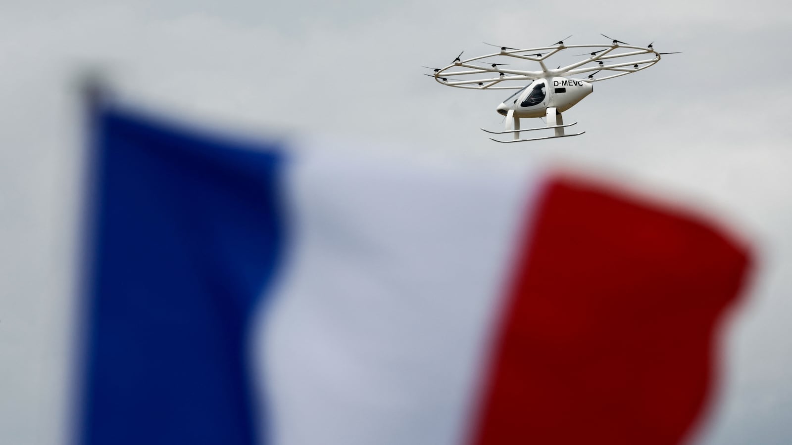 The Volocopter urban air mobility (UAM) aerial taxi performs a flying display at the 54th International Paris Airshow.