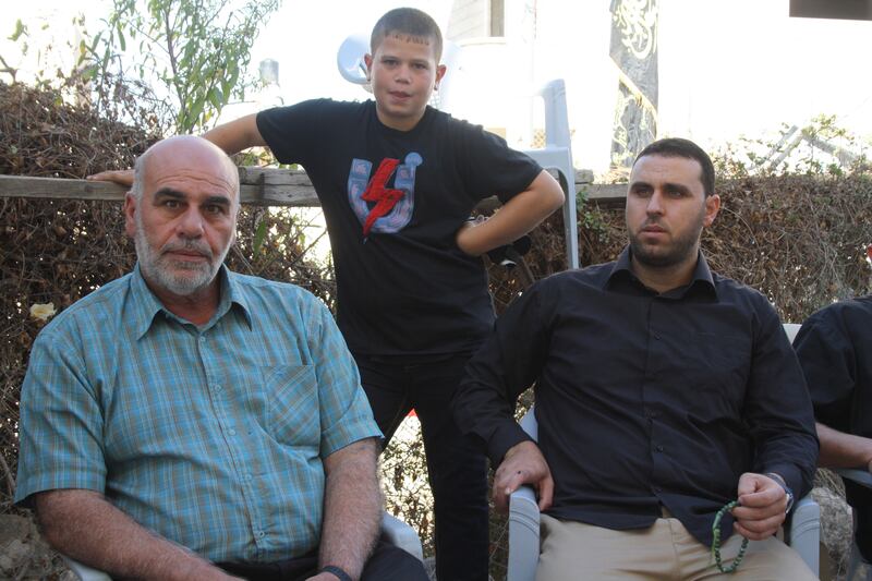 articles/2013/10/30/at-west-bank-funeral-palestinians-express-rising-support-for-armed-resistance/mohammed-assi-family-openz_d2f72p