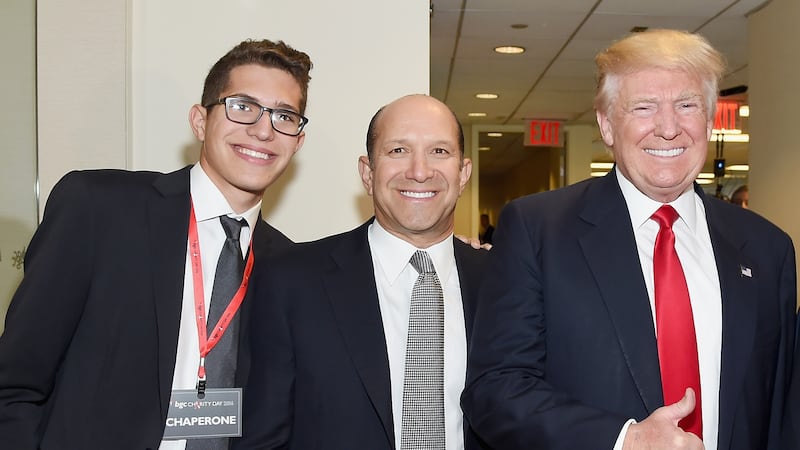Brandon Lutnick and Howard Lutnick pictured with Donald Trump in 2016.