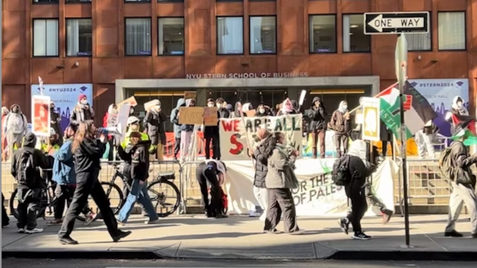 Protesters march at NYU's "Gaza Solidarity Encampment" in New York City on April 22, 2024.