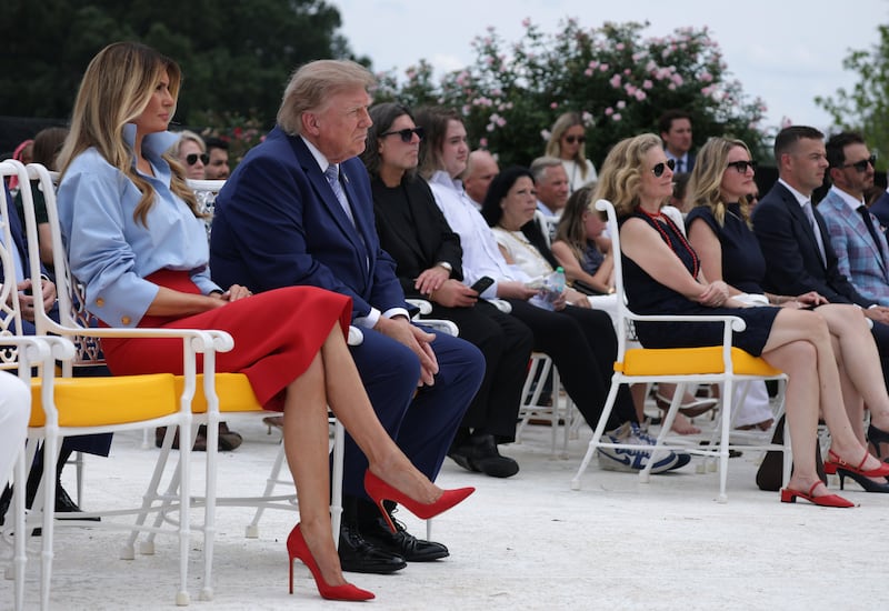 President Donald Trump and first lady Melania Trump among the crowd in the Rose Garden.