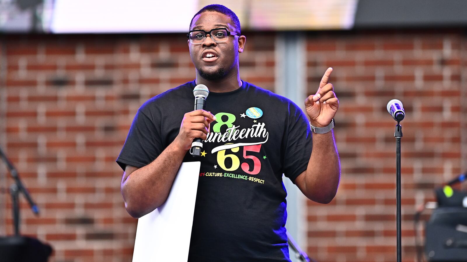 Former Stockbridge Mayor Jayden Williams speaks onstage during this past Juneteenth at The Bridge in Stockbridge, Georgia.