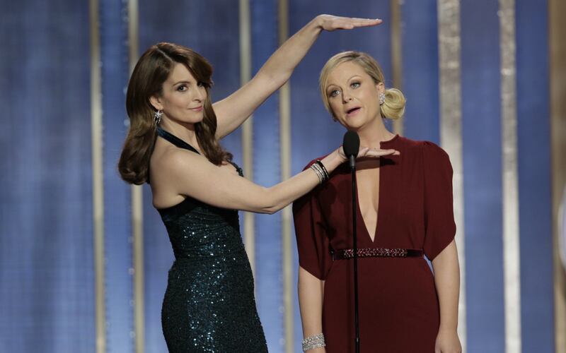articles/2013/10/15/tina-fey-and-amy-poehler-return-as-globes-hosts-britney-spears-reveals-album-name/Tina-Fey-and-Amy-Poehler-at-the-Golden-Globes-Tease_zixs4a