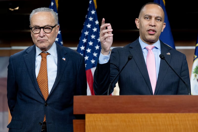 House Minority Leader Hakeem Jeffries speaking at a press conference alongside Senate Minority Leader Chuck Schumer ahead of a vote in the House to extend enhanced ACA tax credits.