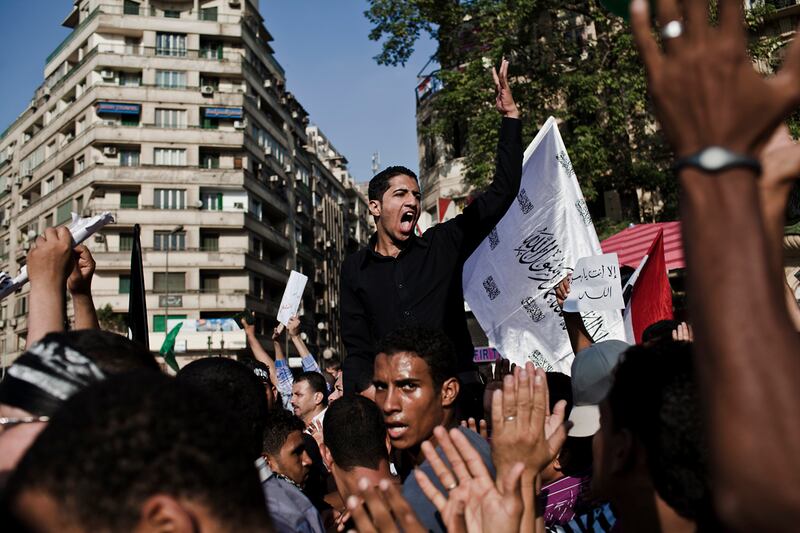 articles/2012/12/11/morsi-opponents-supporters-plan-dueling-cairo-rallies-on-referendum/egypt-protests-giglio_xoa6di