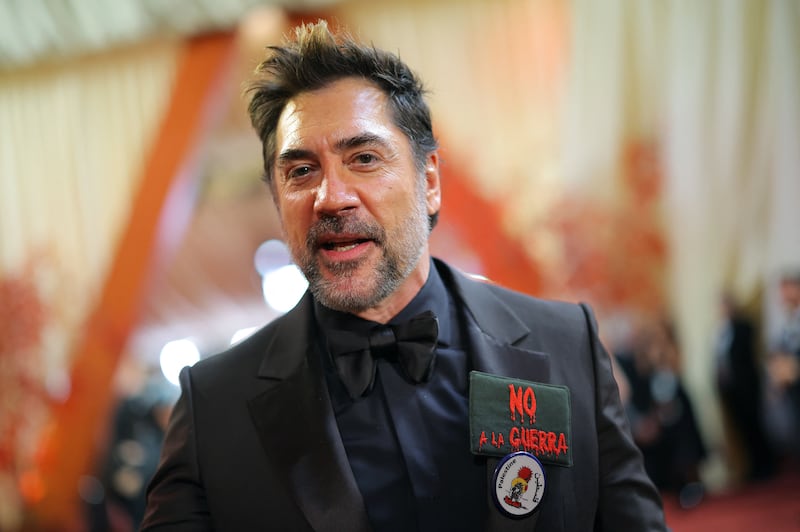 Javier Bardem wears a pin which reads: "Palestine", and a “No a la guerra” (“No to war”) pin, on the red carpet during the Oscars arrivals at the 98th Academy Awards in Hollywood, Los Angeles, California, on March 15, 2026.
