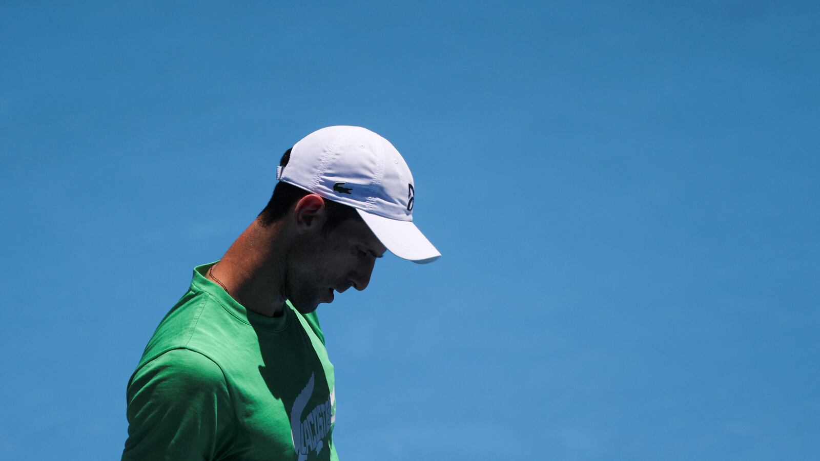 2022-01-13T025544Z_1277172094_RC22YR9X7YU5_RTRMADP_3_TENNIS-AUSTRALIA-DJOKOVIC_fftu8e