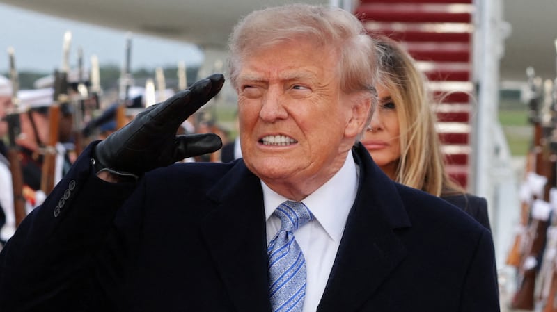 President Donald Trump salutes next to Chinese President Xi Jinping as he arrives ahead of a state visit at Joint Base Andrews, Maryland, US, September 23, 2026.