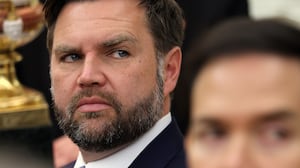 Vice President JD Vance looks on