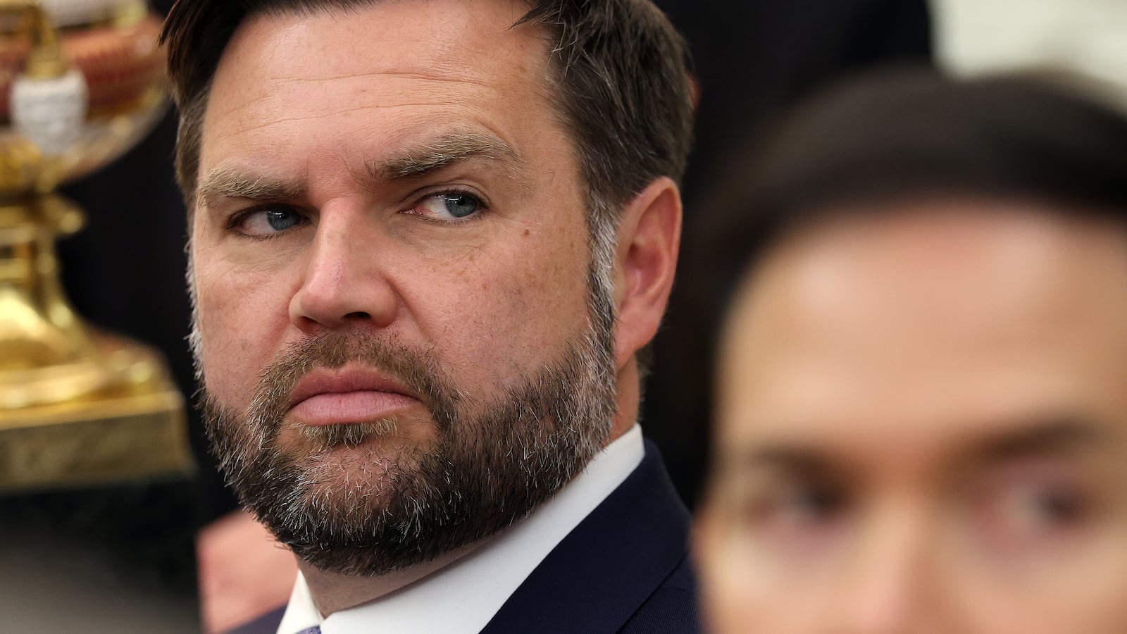 Vice President JD Vance looks on