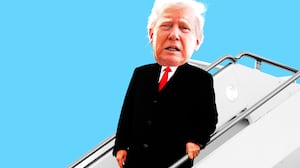 Donald Trump with a scared face going down plane stairs