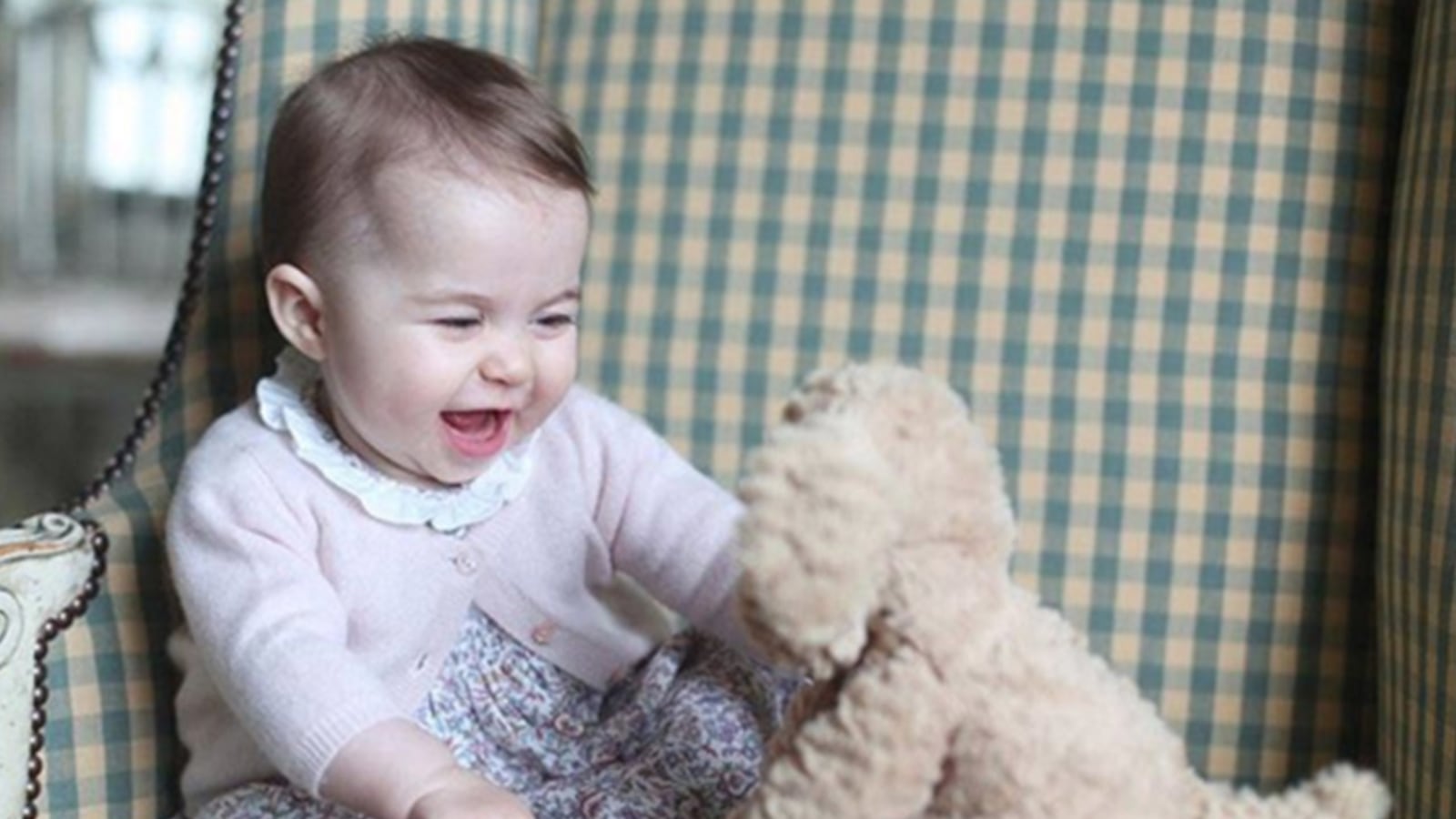 articles/2015/11/29/princess-charlotte-looks-cute-as-a-button-in-new-royal-baby-pic-taken-by-kate/151129-sykes-charlotte-tease_v9ijtw