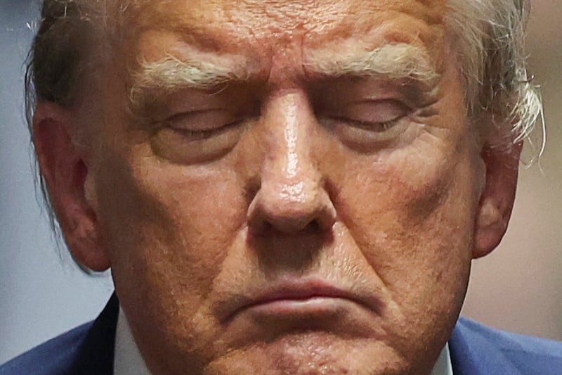 U.S. President Donald Trump closes his eyes, at Manhattan Supreme Court during his hush money trial filed by DA Bragg, in New York, U.S. May 16 2024.