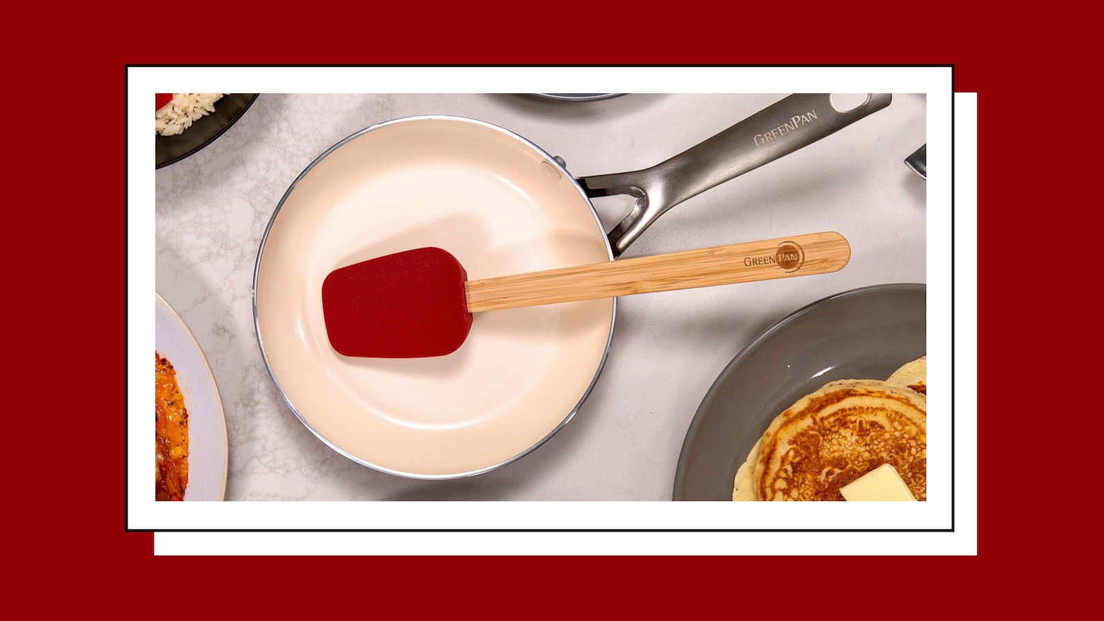 Red spatula with wooden handle in a Greenpan nonstick skillet, available at QVC
