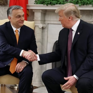 WASHINGTON, DC - MAY 13: U.S. President Donald Trump shakes hands with Hungarian Prime Minister Viktor Orban during a meeting in the Oval Office on May 13, 2019 in Washington, DC. President Trump took questions on trade with China, Iran and other topics. (Photo by Mark Wilson/Getty Images)