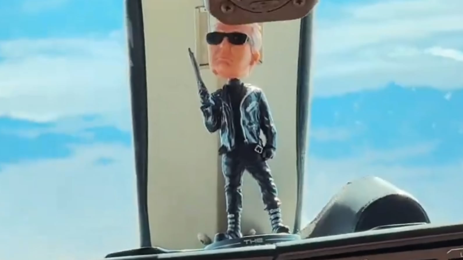 The Trumpinator bobblehead in the cockpit of Trump Force One.
