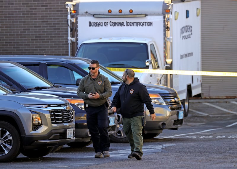 Providence Police officers outside of the Barus and Holley building on the campus of Brown University on December 18, 2025.
