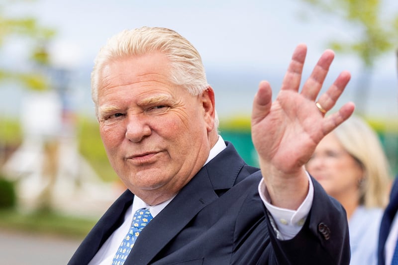 Ontario Premier Doug Ford waves at supporters before speaking to the media about the collapse of trade talks between Canada and the United States, in Hamilton, Ontario, Canada, August 24, 2026. REUTERS/Carlos Osorio