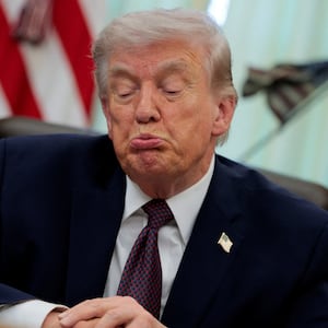 U.S. President Donald Trump reacts