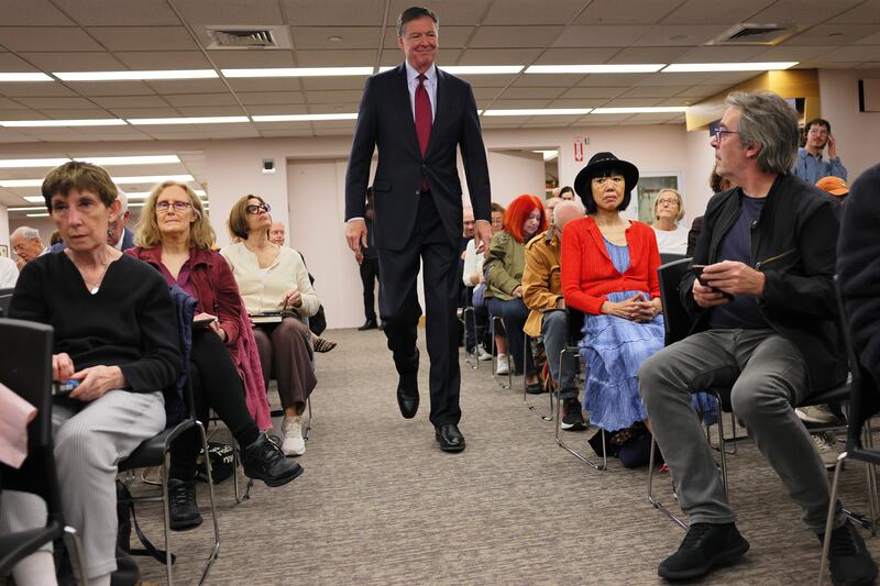 James Comey, 64, is often the tallest man in the building.