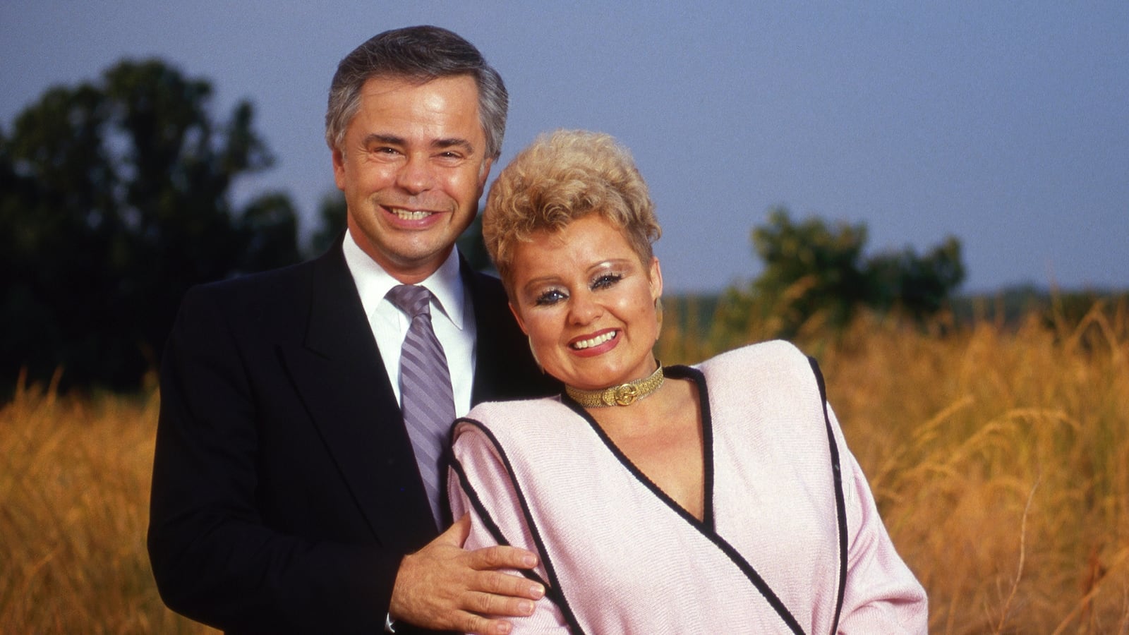 Jim and Tammy Faye Bakker on a hill overlooking their megachurch complex, Heritage USA,in Fort Mill, South Carolina in August 1987. (Photo by Will & Deni McIntyre/Getty Images)