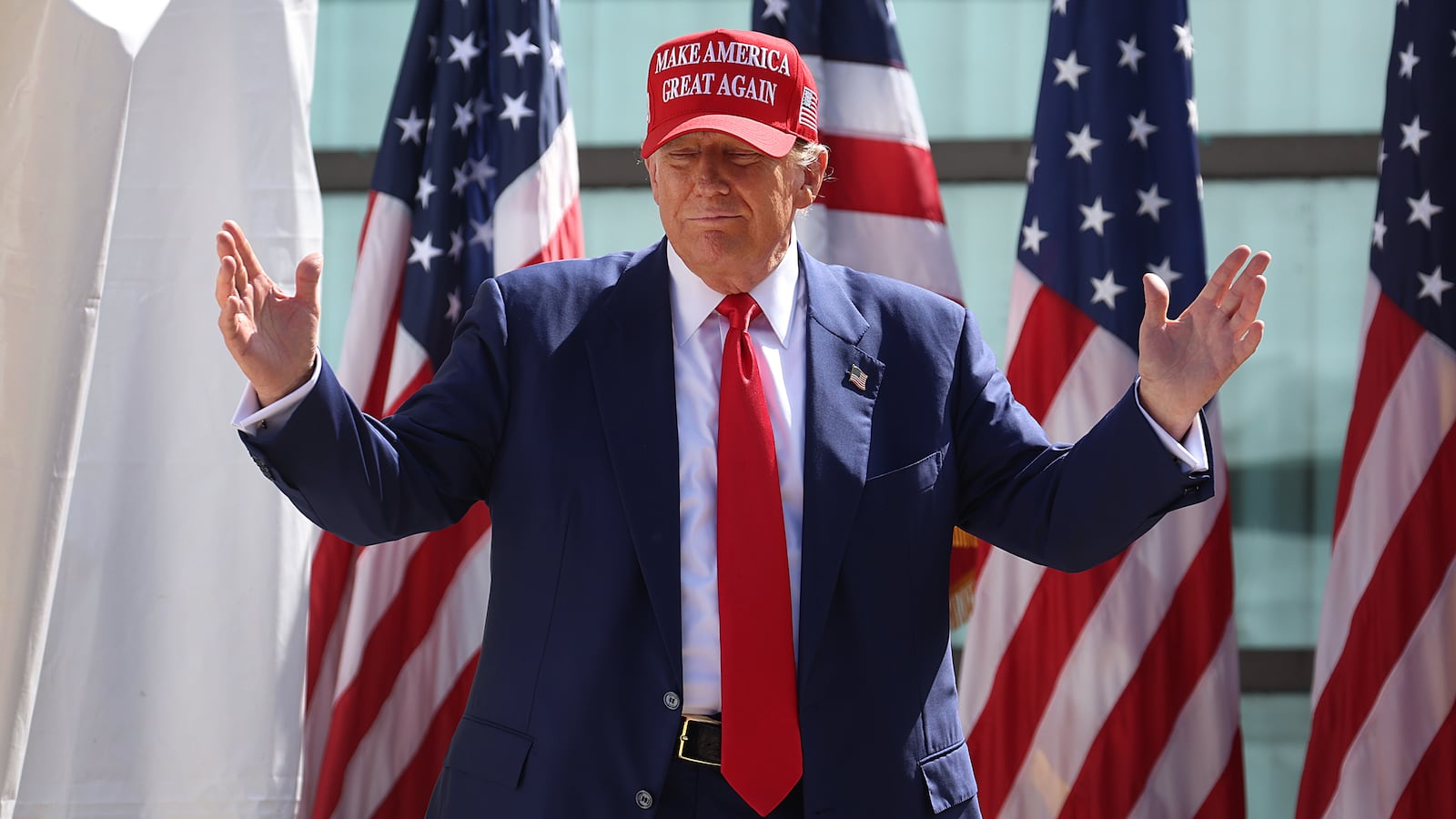 Republican presidential candidate former President Donald Trump arrives for a rally at Festival Park on June 18, 2024 in Racine, Wisconsin.