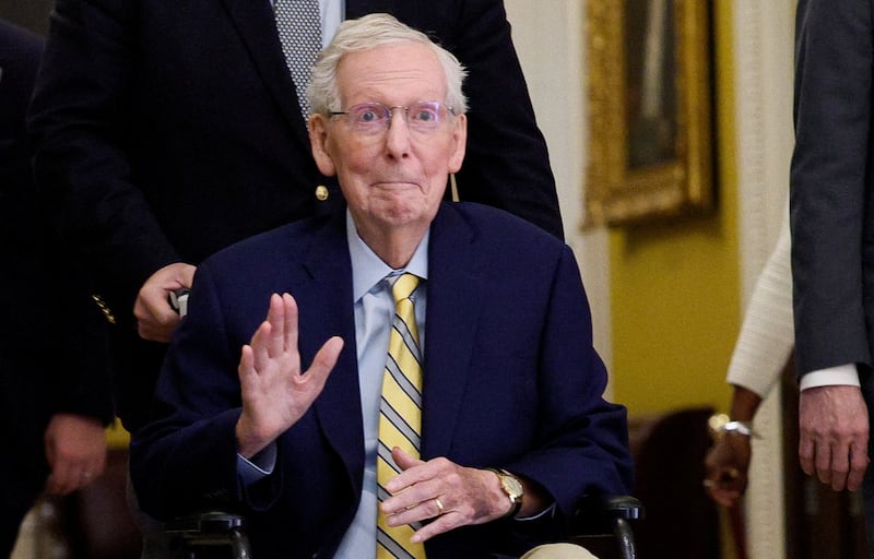 U.S. Senator Mitch McConnell (R-KY) waves at reporters outside the Senate Chamber after he returned to Capitol Hill in Washington, D.C., U.S., September 14, 2026.