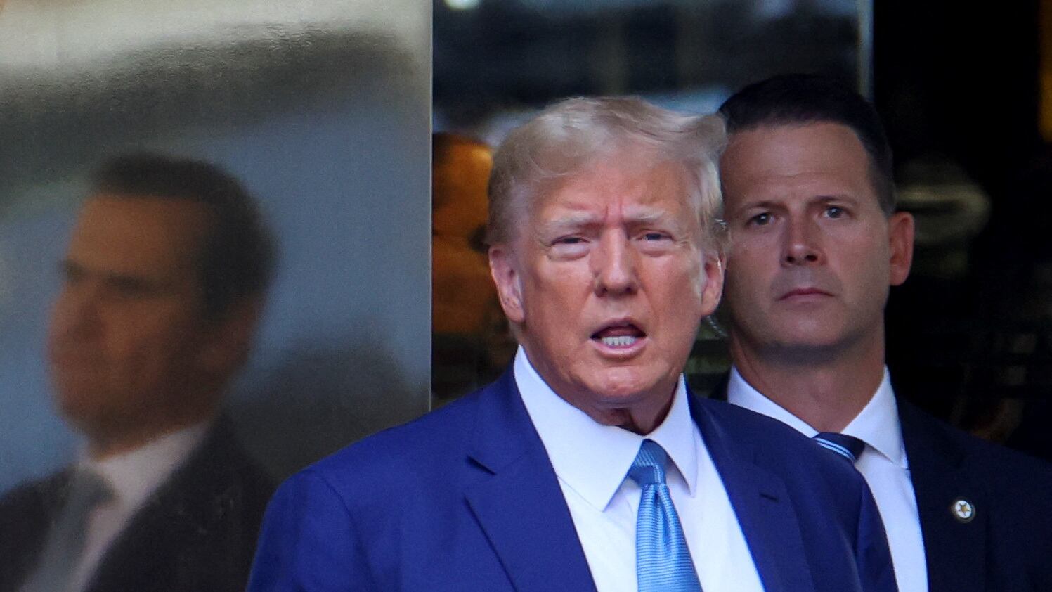 2023-04-13T140504Z_812364596_RC2QD0AM97FT_RTRMADP_3_USA-TRUMP-NEW-YORK-CIVIL_mx9fab