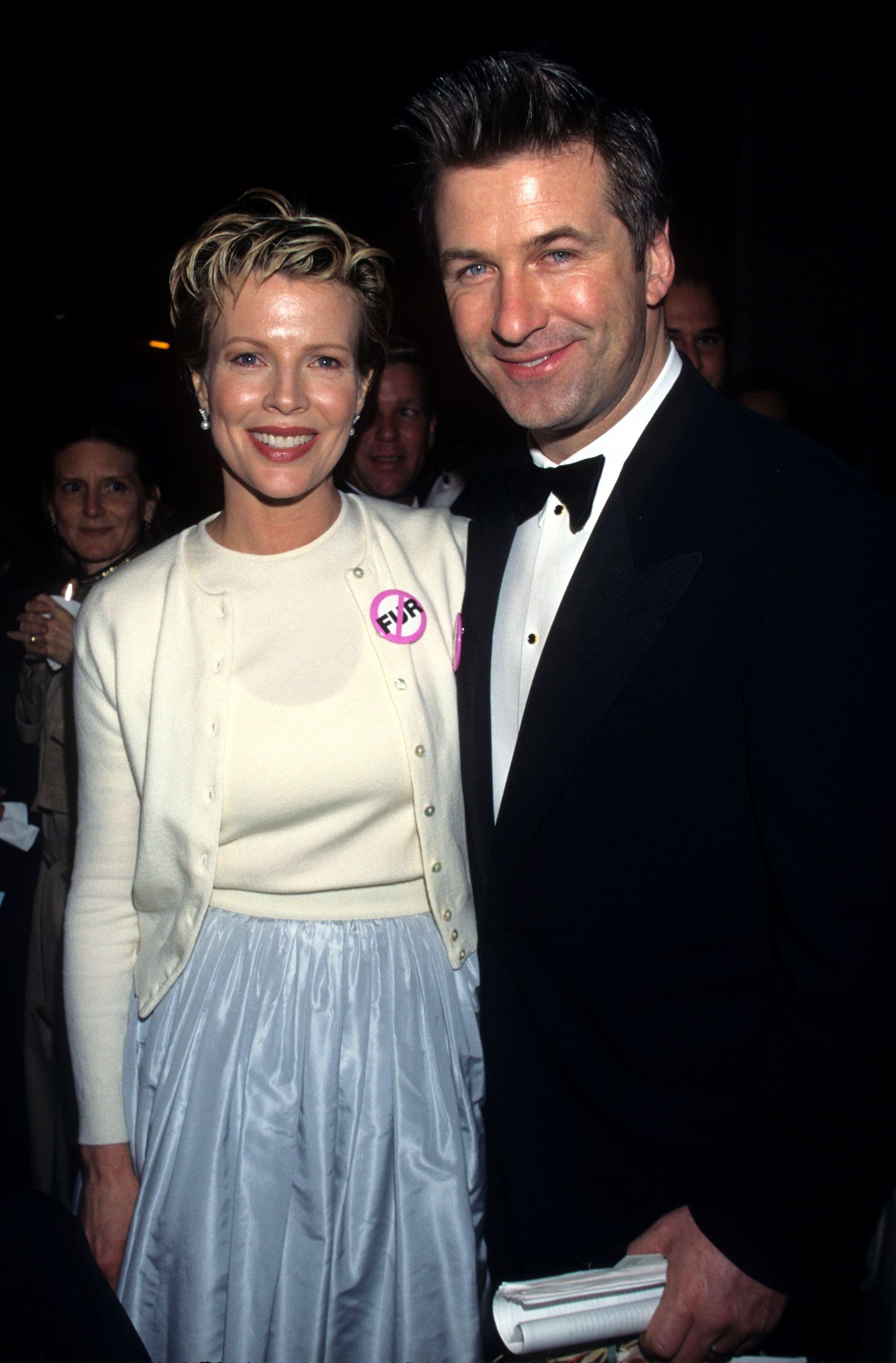 Ireland Baldwin's parents, Kim Basinger and Alec Baldwin, pose at the PETA Animal Ball in 1996.
