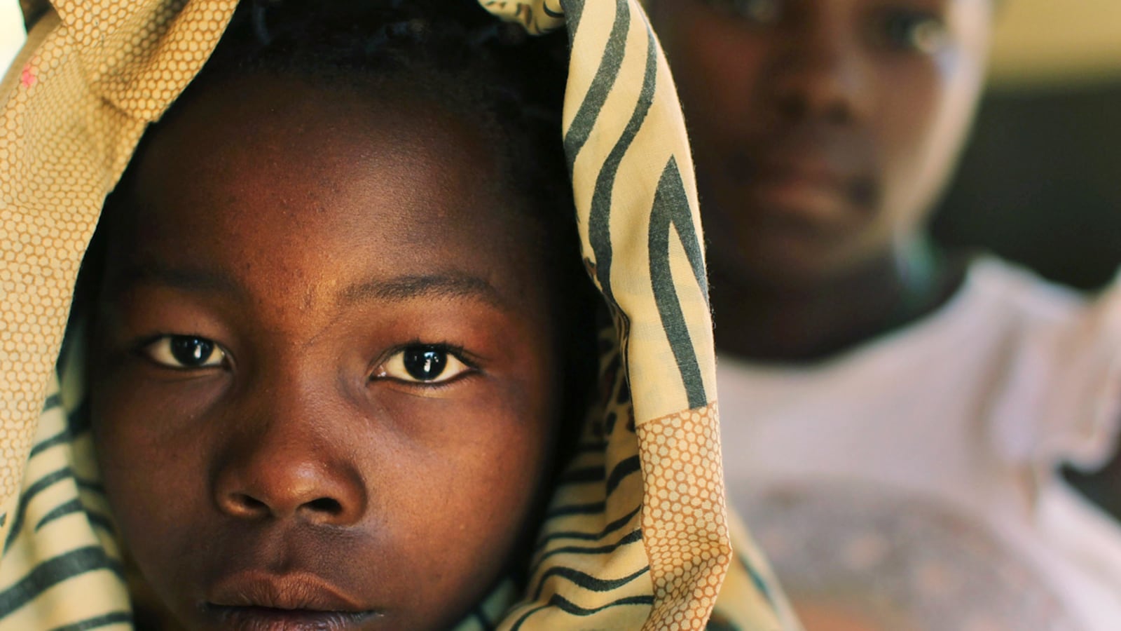 articles/2011/09/23/machine-gun-preacher-shines-a-light-on-rescuing-child-soldiers/sudan-lra-victims-prendergast-benner_zyjywx