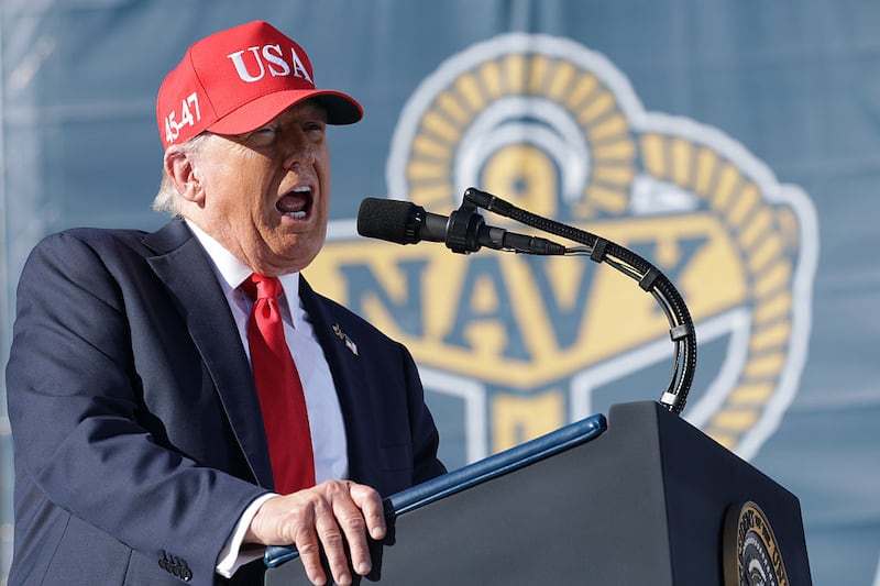 U.S. President Donald Trump makes remarks during the Navy 250 Celebration aboard the USS Harry S. Truman aircraft carrier on October 5, 2025 in Norfolk, Virginia. President Trump is visiting Naval Station Norfolk in Virginia for a celebration of the 250th birthday of the U.S. Navy. (Photo by Alex Wong/Getty Images)