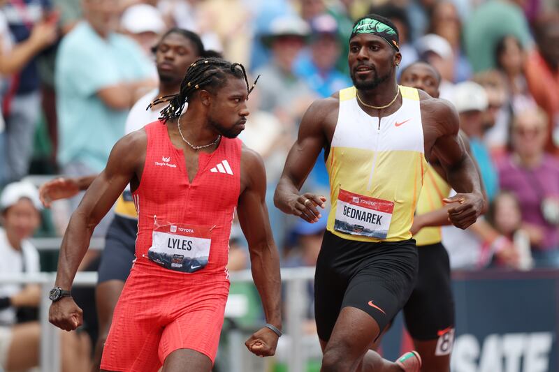 Noah Lyles stares down Kenny Bednarek as he passed him at the end of the Men's 200 meter final at the 2025 USATF Outdoor Championships in Eugene, Oregon.