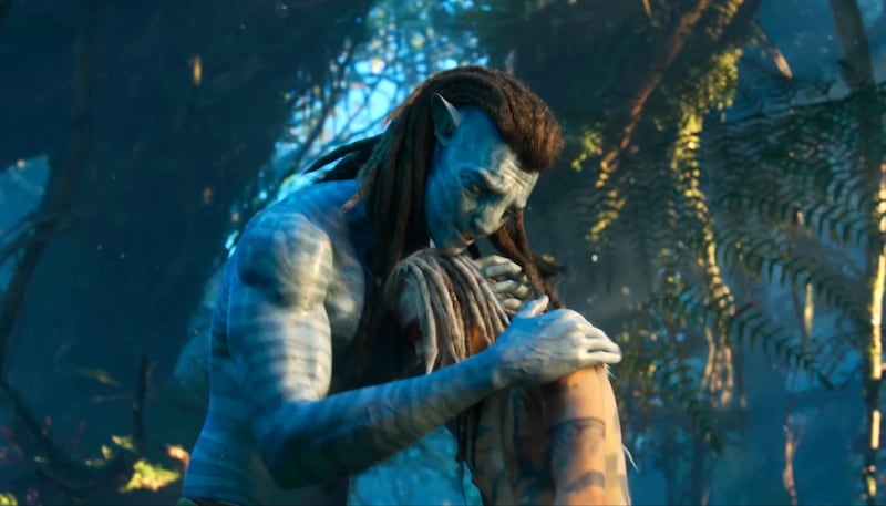 Avatar: Fire and Ash, Jake hugging Spider. (20th Century Studios.)