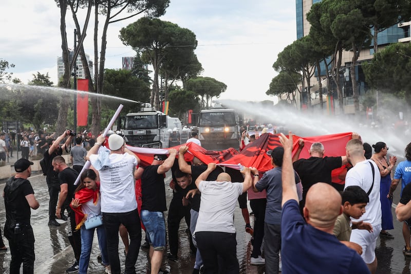 Police use water cannons during a protest against a luxury resort, a plan by a company linked to Donald Trump's son-in-law, Jared Kushner, on an environmentally sensitive part of the Adriatic coast, in Tirana, Albania, June 3, 2026.