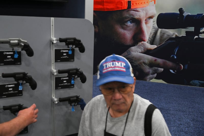 Handguns are displayed as people attend the National Rifle Association’s (NRA) annual meetings and exhibits in Houston, Texas, U.S., April 18, 2026.