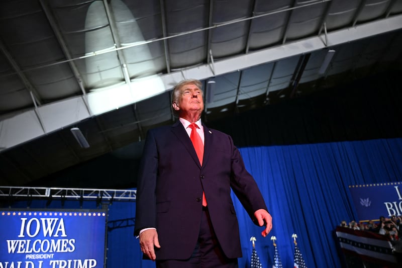 U.S. President Donald Trump arrives to deliver remarks on the economy in Clive, Iowa, on January 27, 2026.