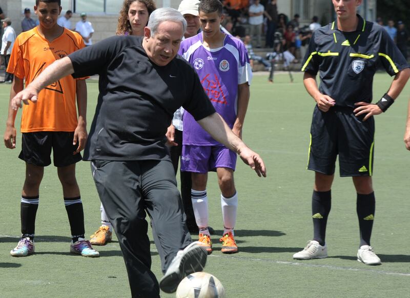 articles/2012/07/18/mofaz-fumbles-netanyahu-hits-rough-turf/netanyahu-soccer-openz_pvmwcj