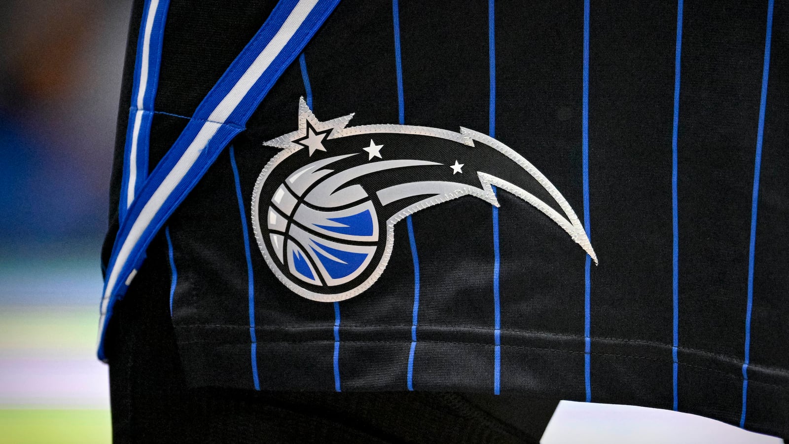 The Orlando Magic logo.