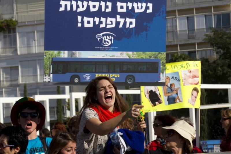 articles/2012/10/15/the-bare-fact-of-her-bodily-presence/womenprotesting-openz-jpeg_r6djbb