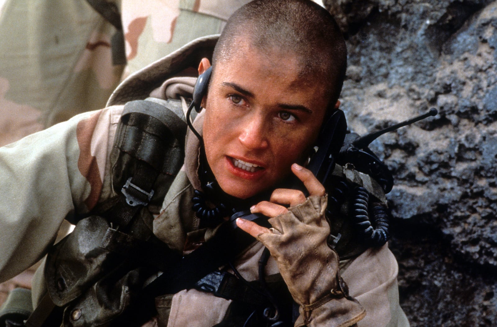 Demi Moore talking on walkie talkie in a scene from the film 'G.I. Jane', 1997. (Photo by Buena Vista/Getty Images)