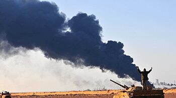 cheats/2011/03/24/nato-to-take-over-libya-mission/libya-fighting_i3cwwp