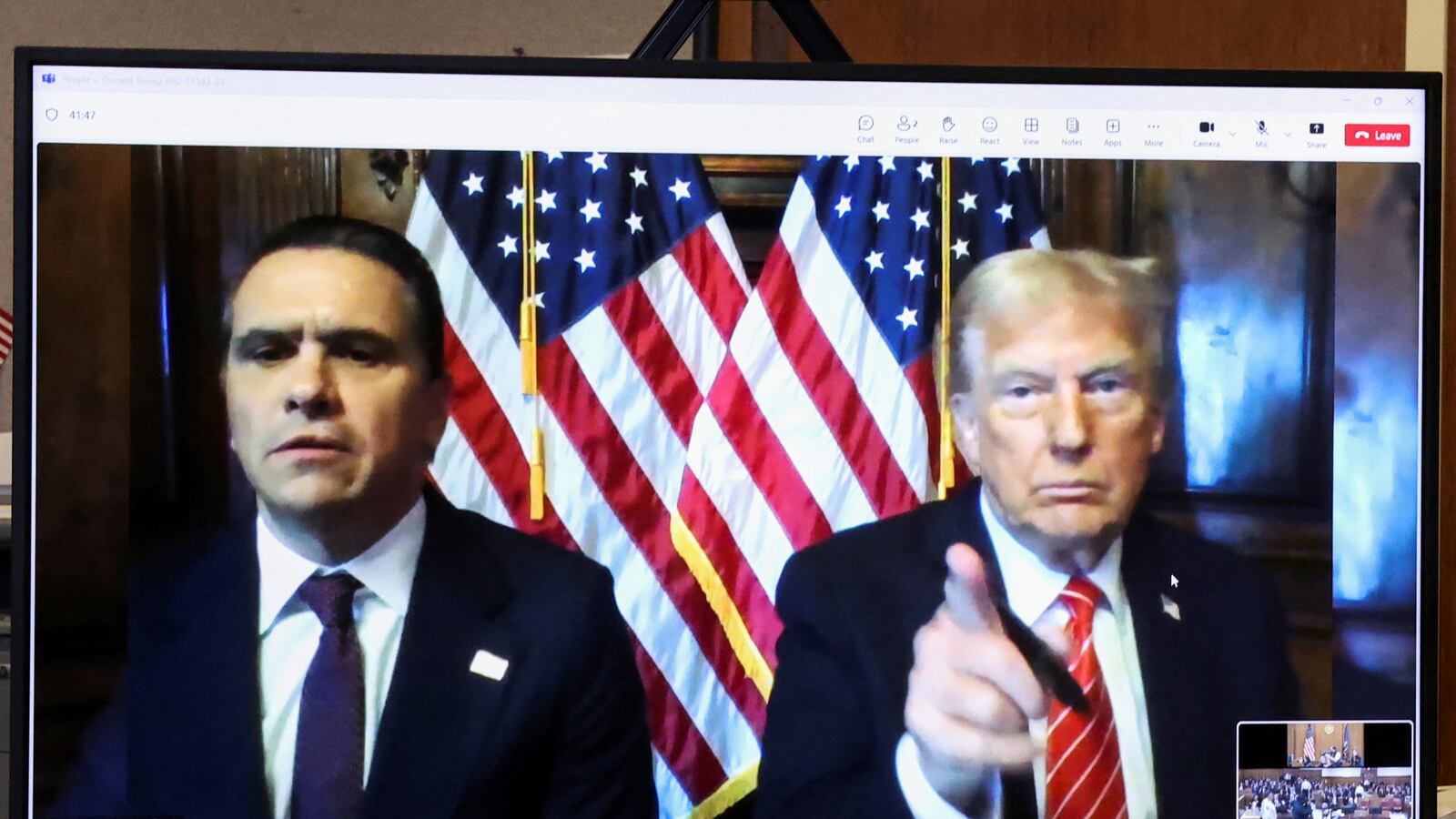 Donald Trump appears remotely for a sentencing hearing Friday alongside his attorney, Todd Blanche.