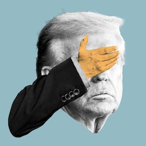 Donald Trump with a face palm over his face