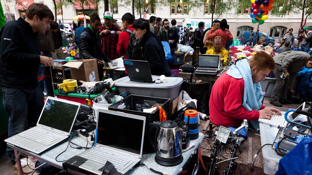 articles/2011/10/06/occupy-wall-street-protests-tech-gurus-televise-the-demonstrations/occupy-wall-street-tech-media-team-schlinkert_ri2h6i