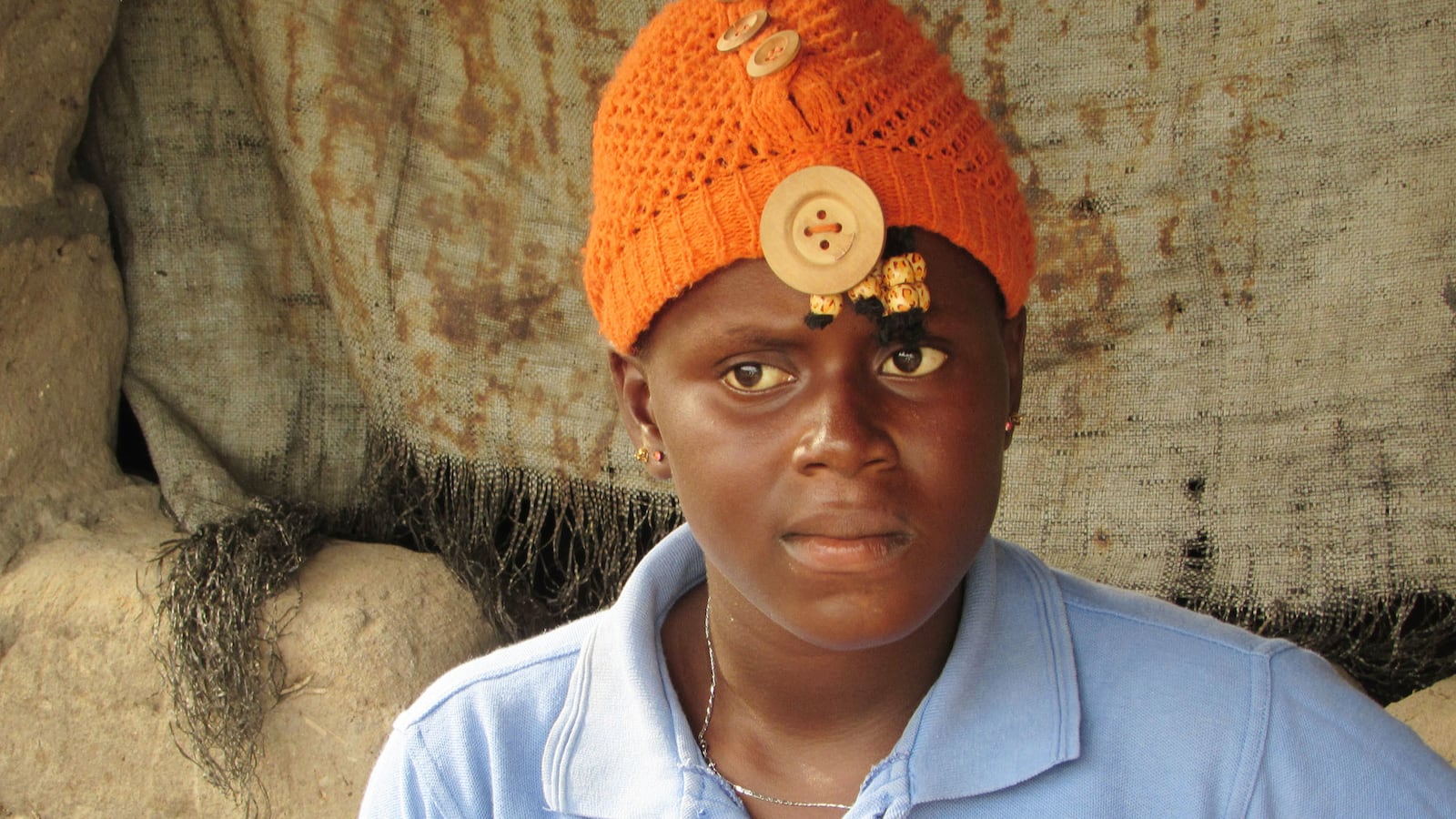 articles/2015/03/17/this-ebola-orphan-watched-her-family-die/150316-haglage-orphans-tease_lf4glw